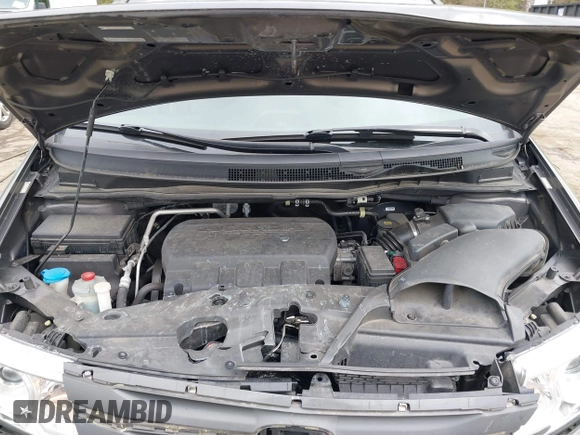 2013 Honda Odyssey Touring with VIN 5FNRL5H94DB013310, listed as a IAAI auction lot 42079565 with 128,622 mi miles and . Bid and sale history available at carsss.com. Image 10.
