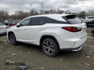 2022 Lexus RX with VIN JTJHZKFA5N2039857, listed as a Copart auction lot 42733963 with 7,011 mi miles. Bid and sale history available at carsss.com. Image 2.
