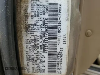 2000 Toyota Avalon XL z VIN 4T1BF28B4YU032815, wystawiony jako Copart lot #55579375 z przebiegiem Nie podano mil oraz Nie do naprawy • Non repairable. Historia ofert i sprzedaży dostępna na DreamBid. Obrazek 13.