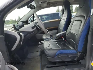 2017 BMW i3 z VIN WBY1Z8C32HV890898, wystawiony jako Copart lot #57968095 z przebiegiem 76 806 mil mil oraz Szkody całkowita. Historia ofert i sprzedaży dostępna na DreamBid. Obrazek 7.