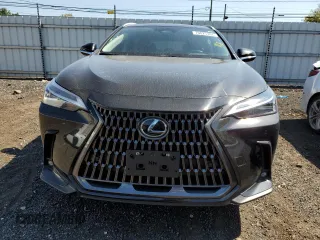 2023 Lexus NX with VIN 2T2GKCEZ4PC014027, listed as a Copart auction lot 70025704 with 24,597 mi miles and Salvage Title. Bid and sale history available at carsss.com. Image 5.