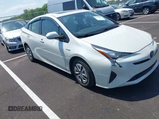 2017 Toyota Prius Two with VIN JTDKARFU7H3054054, listed as a IAAI auction lot 42028565 with 64,805 mi miles. Bid and sale history available at carsss.com. Image 1.