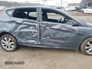 2013 Hyundai Accent SE with VIN KMHCU5AE1DU091931, listed as a IAAI auction lot 41783034 with 72,732 mi miles. Bid and sale history available at carsss.com. Image 6.
