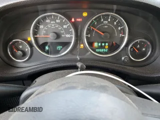 2013 Jeep Wrangler Sport with VIN 1C4AJWAG7DL670990, listed as a Copart auction lot 49910235 with 109,892 mi miles and Salvage Title. Bid and sale history available at carsss.com. Image 9.