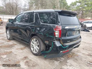 2023 Chevrolet Tahoe High Country with VIN 1GNSKTKT8PR441562, listed as a IAAI auction lot 41544253 with 24,453 mi miles. Bid and sale history available at carsss.com. Image 3.