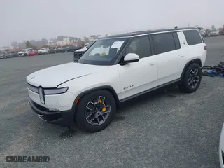 2023 Rivian R1S Adventure with VIN 7PDSGABA8PN017893, listed as a IAAI auction lot 41573814 with NaN miles. Bid and sale history available at carsss.com. Image 20.
