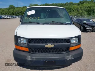 2014 Chevrolet Express Cargo with VIN 1GCSGAFX5E1152985, listed as a IAAI auction lot 42483478 with 208,518 mi miles and . Bid and sale history available at DreamBid. Image 6.