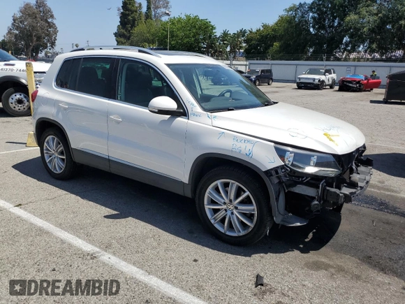 2012 Volkswagen Tiguan SE z VIN WVGAV7AX5CW546378, wystawiony jako Copart lot #58186695 z przebiegiem 67 483 mil mil oraz Szkoda całkowita • Salvage title. Historia ofert i sprzedaży dostępna na DreamBid. Obrazek 4.