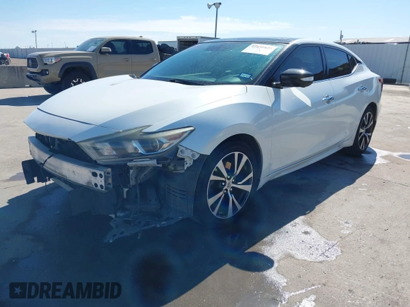 2016 Nissan Maxima SV z VIN 1N4AA6AP8GC436917, wystawiony jako IAAI lot #41691025 z przebiegiem 140 149 mil mil oraz . Historia ofert i sprzedaży dostępna na DreamBid. Obrazek 20.