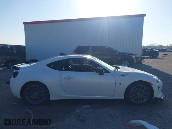 2017 Toyota 86 z VIN JF1ZNAA1XH8707535, wystawiony jako IAAI lot #41969546 z przebiegiem 85 468 mil mil oraz . Historia ofert i sprzedaży dostępna na DreamBid. Obrazek 13.