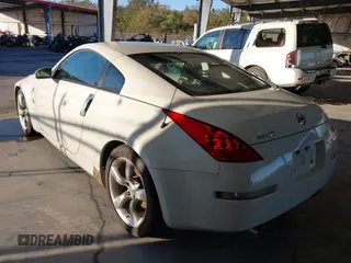 2006 Nissan 350Z Touring z VIN JN1AZ34D86M307042, wystawiony jako IAAI lot #41016528 z przebiegiem 124 303 mil mil oraz . Historia ofert i sprzedaży dostępna na DreamBid. Obrazek 3.