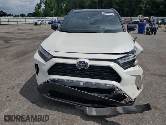 2022 Toyota RAV4 Hybrid XSE with VIN 2T3E6RFVXNW031612, listed as a Copart auction lot 60544055 with 99,831 mi miles and Salvage title. Bid and sale history available at DreamBid. Image 5.