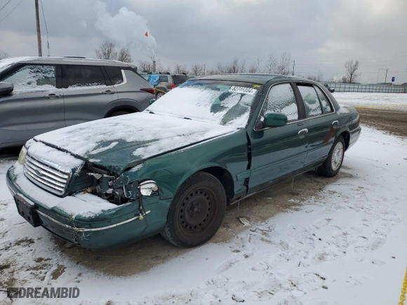 2000 Ford Crown Victoria with VIN 2FAFP73WXYX157746, listed as a Copart auction lot 82748804 with 56,820 mi miles and Salvage Title. Bid and sale history available at carsss.com. Image 1.