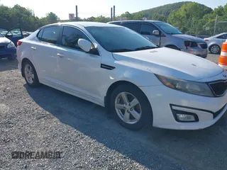 2015 Kia Optima LX with VIN 5XXGM4A70FG472650, listed as a IAAI auction lot 42698013 with 213,713 mi miles and . Bid and sale history available at DreamBid. Image 1.