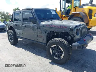 2019 Jeep Wrangler Unlimited Rubicon with VIN 1C4HJXFN9KW507281, listed as a IAAI auction lot 42695939 with 60,802 mi miles and . Bid and sale history available at DreamBid. Image 1.