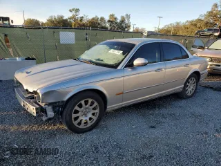 2004 Jaguar XJ with VIN SAJWA71C84SG32106, listed as a Copart auction lot 81837704 with 119,268 mi miles and Salvage Title. Bid and sale history available at carsss.com. Image 1.