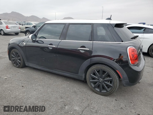 2017 MINI Hardtop 4 Door Cooper with VIN WMWXU1C30H2E19304, listed as a Copart auction lot 51008575 with 34,526 mi miles and Salvage Title. Bid and sale history available at DreamBid. Image 2.