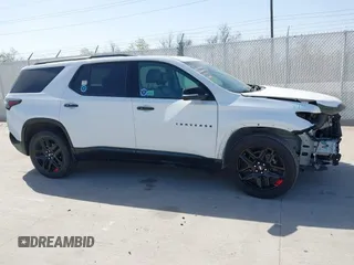2021 Chevrolet Traverse Premier with VIN 1GNERKKW4MJ164822, listed as a IAAI auction lot 41859580 with 82,383 mi miles. Bid and sale history available at carsss.com. Image 13.