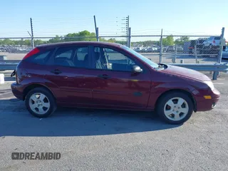 2007 Ford Focus S with VIN 1FAHP37N67W198470, listed as a IAAI auction lot 41990511 with 191,107 mi miles and . Bid and sale history available at carsss.com. Image 13.