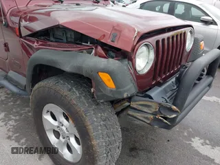 2003 Jeep Wrangler Sport with VIN 1J4FA49S63P324904, listed as a IAAI auction lot 42138001 with 170,917 mi miles and . Bid and sale history available at DreamBid. Image 6.