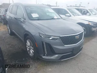 2020 Cadillac XT6 FWD Premium Luxury with VIN 1GYKPCRSXLZ105231, listed as a IAAI auction lot 42115169 with 70,319 mi miles. Bid and sale history available at carsss.com. Image 1.