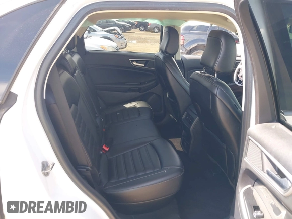 2020 Ford Edge SEL z VIN 2FMPK4J90LBA28960, wystawiony jako IAAI lot #42264189 z przebiegiem 91 312 mil mil oraz . Historia ofert i sprzedaży dostępna na DreamBid. Obrazek 8.