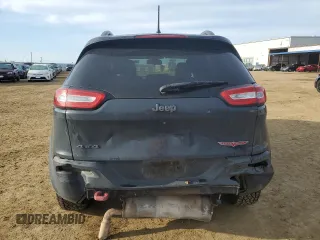 2017 Jeep Cherokee Trailhawk L Plus with VIN 1C4PJMBB1HW518788, listed as a Copart auction lot 49539005 with 237,662 mi miles and Salvage Title. Bid and sale history available at carsss.com. Image 6.