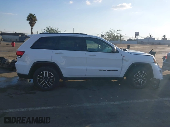 2021 Jeep Grand Cherokee Trailhawk with VIN 1C4RJFLG5MC565316, listed as a IAAI auction lot 41402435 with 69,261 mi miles. Bid and sale history available at carsss.com. Image 13.
