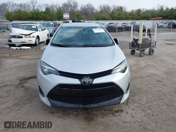 2019 Toyota Corolla L with VIN 5YFBURHE2KP934042, listed as a IAAI auction lot 41963491 with 87,299 mi miles. Bid and sale history available at carsss.com. Image 13.