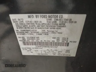 2014 Ford Taurus Limited with VIN 1FAHP2F80EG105147, listed as a IAAI auction lot 41899174 with 137,451 mi miles and . Bid and sale history available at DreamBid. Image 9.