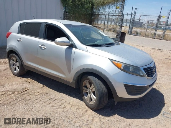 2012 Kia Sportage LX with VIN KNDPB3A27C7326884, listed as a IAAI auction lot 42010016 with 112,797 mi miles. Bid and sale history available at carsss.com. Image 1.