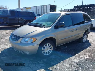 2002 Chrysler Town & Country EX with VIN 2C8GP74LX2R573857, listed as a IAAI auction lot 41846302 with Not Provided miles and . Bid and sale history available at carsss.com. Image 16.