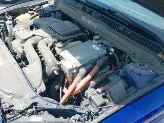 2015 Ford Fusion SE Hybrid with VIN 3FA6P0LU5FR172026, listed as a IAAI auction lot 42516523 with 124,328 mi miles and . Bid and sale history available at DreamBid. Image 19.