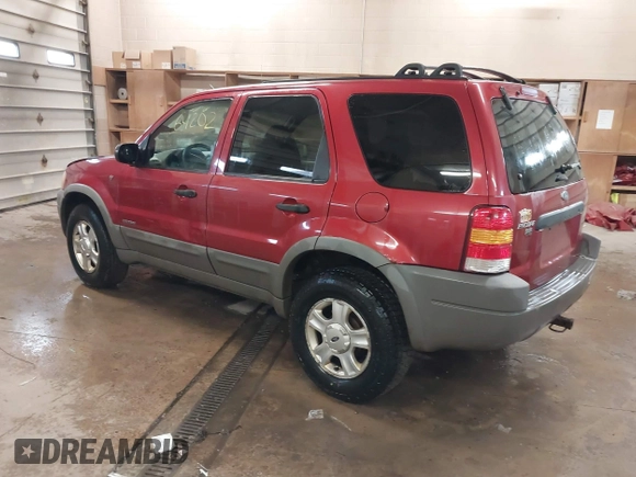 2001 Ford Escape XLT with VIN 1FMYU04101KF46809, listed as a IAAI auction lot 41664202 with 256,468 mi miles. Bid and sale history available at carsss.com. Image 3.