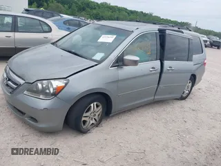 2005 Honda Odyssey EX-L z VIN 5FNRL38775B117598, wystawiony jako IAAI lot #42276239 z przebiegiem 184 134 mil mil oraz . Historia ofert i sprzedaży dostępna na DreamBid. Obrazek 2.