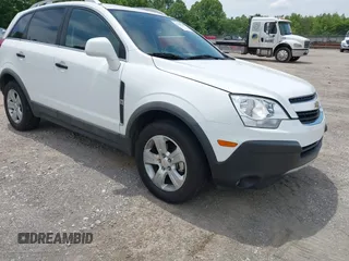 2014 Chevrolet Captiva Sport LS z VIN 3GNAL2EK2ES621832, wystawiony jako IAAI lot #42246539 z przebiegiem 73 788 mil mil oraz . Historia ofert i sprzedaży dostępna na DreamBid. Obrazek 1.