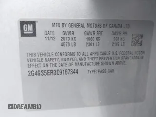 2013 Buick Regal Premium 1 z VIN 2G4GS5ER3D9167344, wystawiony jako IAAI lot #42097418 z przebiegiem 95 452 mil mil oraz . Historia ofert i sprzedaży dostępna na DreamBid. Obrazek 9.