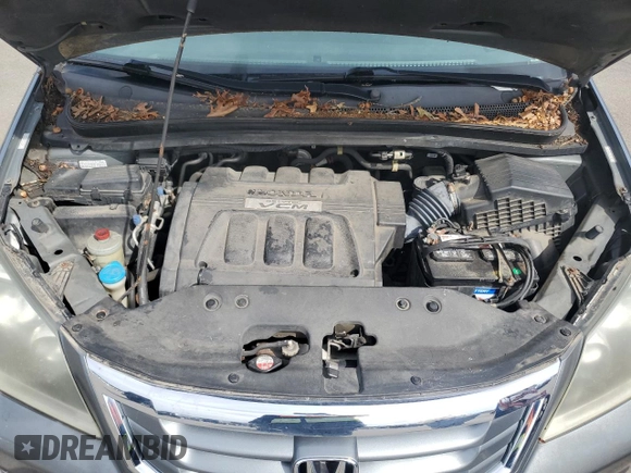 2009 Honda Odyssey EX-L с VIN 5FNRL38609B017694, выставлен на аукционе Copart как лот 50815515 с пробегом 192 265 миль миль и Чистый • Clean title. История ставок и продаж доступна на DreamBid. Изображение 12.