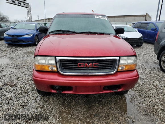 2000 GMC Jimmy SLE Convenience z VIN 1GKDT13W0Y2273829, wystawiony jako Copart lot #84811284 z przebiegiem 129 635 mil mil oraz Szkoda całkowita • Salvage title. Historia ofert i sprzedaży dostępna na DreamBid. Obrazek 5.