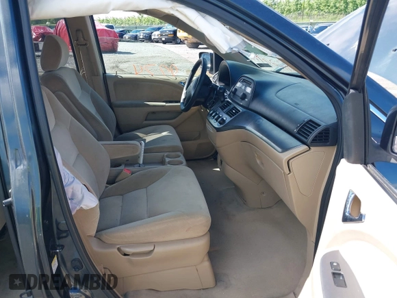 2005 Honda Odyssey LX with VIN 5FNRL38205B128740, listed as a IAAI auction lot 42209974 with 183,014 mi miles and . Bid and sale history available at DreamBid. Image 5.