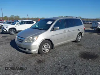 2005 Honda Odyssey EX with VIN 5FNRL38445B411188, listed as a IAAI auction lot 42060307 with 240,688 mi miles. Bid and sale history available at carsss.com. Image 2.