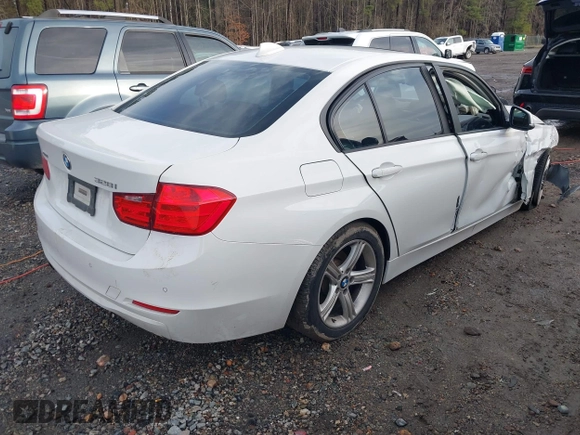 2015 BMW 3 Series 328i xDrive with VIN WBA3B5G59FNS19005, listed as a IAAI auction lot 41570070 with 104,666 mi miles. Bid and sale history available at carsss.com. Image 4.