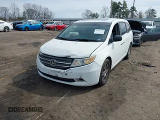 2011 Honda Odyssey EX-L with VIN 5FNRL5H67BB070541, listed as a IAAI auction lot 41812554 with 150,898 mi miles and . Bid and sale history available at DreamBid. Image 17.