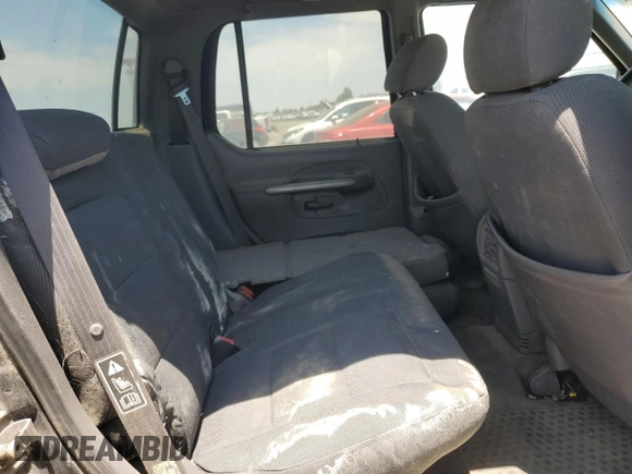 2001 Ford Explorer Sport Trac z VIN 1FMZU77E61UB26259, wystawiony jako Copart lot #62541145 z przebiegiem 258 417 mil mil oraz Czysty tytuł • Clean title. Historia ofert i sprzedaży dostępna na DreamBid. Obrazek 10.