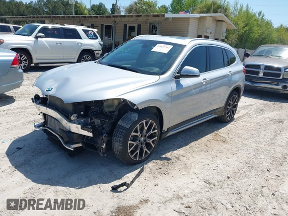 2021 BMW X1 sDrive28i with VIN WBXJG7C06M5T14235, listed as a IAAI auction lot 42021762 with 53,384 mi miles and . Bid and sale history available at DreamBid. Image 2.