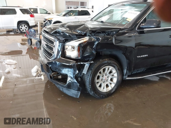2020 GMC Yukon SLT with VIN 1GKS2BKC6LR232354, listed as a IAAI auction lot 41313325 with 107,960 mi miles. Bid and sale history available at carsss.com. Image 6.