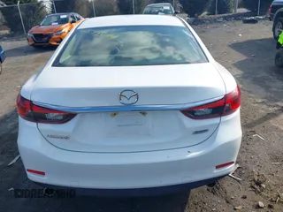 2016 Mazda Mazda6 i Sport with VIN JM1GJ1U55G1484856, listed as a IAAI auction lot 41543599 with 78,486 mi miles. Bid and sale history available at carsss.com. Image 16.