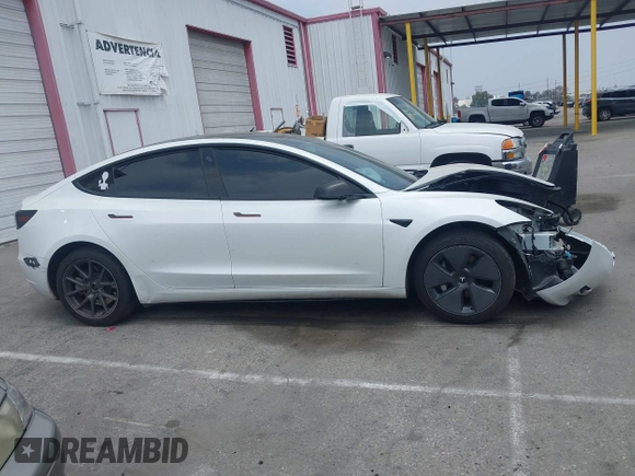 2023 Tesla Model 3 with VIN 5YJ3E1EA2PF417959, listed as a IAAI auction lot 42463853 with 22,736 mi miles and . Bid and sale history available at DreamBid. Image 14.