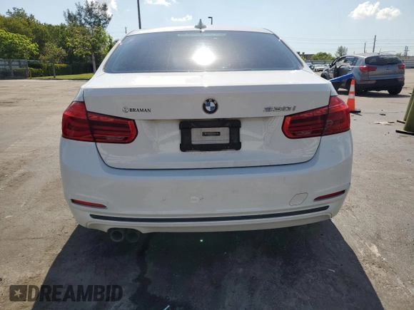 2018 BMW 3 Series 330i with VIN WBA8B9C58JEE80964, listed as a Copart auction lot 57103285 with 188,488 mi miles and Salvage title. Bid and sale history available at DreamBid. Image 6.