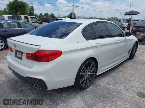2019 BMW 5 Series 540i with VIN WBAJE5C54KWW08398, listed as a IAAI auction lot 42477384 with 48,936 mi miles and . Bid and sale history available at DreamBid. Image 4.